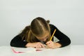 Cute girl is doing her homework Royalty Free Stock Photo