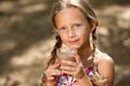 Cute girl drinking milk chocolate. Royalty Free Stock Photo