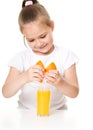 Cute girl is drinking orange juice Royalty Free Stock Photo