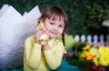 Cute girl with duckling