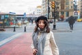 Cute girl explores streets of city with map Royalty Free Stock Photo