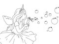 Cute girl in a fairy costume blowing soap bubbles