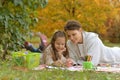 Cute girl with her mother doing homework Royalty Free Stock Photo