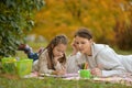 Cute girl with her mother doing homework Royalty Free Stock Photo