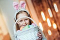 I love to celebrate Easter!Cute girl holding basket with easter eggs and smiling.Celebration concept Royalty Free Stock Photo