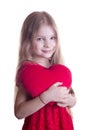 Cute girl holding plush red heart Royalty Free Stock Photo