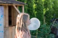 Big bubble from chewing gum and child Royalty Free Stock Photo