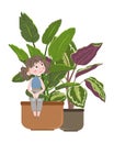 A cute girl in jeans and a fashionable T-shirt sits on the edge of the pot with a beautiful houseplant