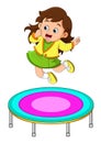 The cute girl is jumping on the trampoline very high