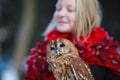 Cute girl with little owl Royalty Free Stock Photo