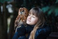 Cute girl with little owl Royalty Free Stock Photo
