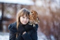 Cute girl with little owl Royalty Free Stock Photo