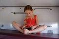 Girl lying on the top shelf in the train.Summer Vacation and Travel Concept. the girl in the train lies on the top shelf