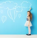 Cute girl making chalk drawings Royalty Free Stock Photo