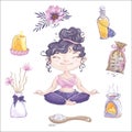 The cute girl meditates in a lotus position and a set of accessories for aromatherapy.