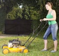 Cute girl moving the grass with yellow lawn mover