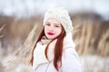 Cute girl outdoors on a sunny winter day. Royalty Free Stock Photo