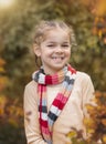 Cute girl outside in autumn