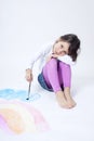 Cute girl painting rainbow Royalty Free Stock Photo