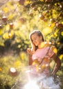 Cute girl picking apples in an orchard Royalty Free Stock Photo