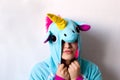 Woman in kigurumi unicorn costume Royalty Free Stock Photo