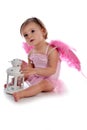 Cute girl with pink wings Royalty Free Stock Photo