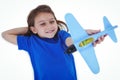 Cute girl playing with airplane Royalty Free Stock Photo