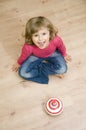 Cute girl playing with spinner