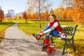 Cute girl putting on roller blades Royalty Free Stock Photo