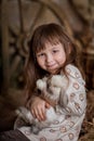 Cute girl with rabbit