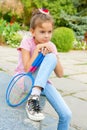 Cute girl with racket Outdoors Royalty Free Stock Photo