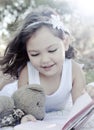 Cute girl reading book Royalty Free Stock Photo