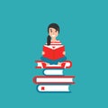 Cute girl with red book siting on stack of books on wide blue background. creative student