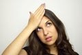 Cute girl remembered something and holding his head Royalty Free Stock Photo