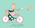 Cute girl riding a bicyle with spring flower and butterflies