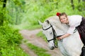 Cute girl riding horse Royalty Free Stock Photo