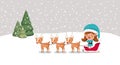 Cute girl santa helper with sled and reindeer Royalty Free Stock Photo