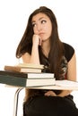 Cute girl at school desk looking distracted looking away