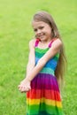 Cute girl seven years on the lawn Royalty Free Stock Photo