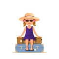 Cute girl in sunglasses sitting on the stack suitcases. Travel and vacation concept. Child with luggage