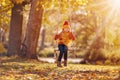 Cute girl swinging on the swing n the sunny park Royalty Free Stock Photo