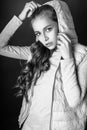 Cute girl teenage with long curly hair posing studio nature portrait. Black and white Royalty Free Stock Photo