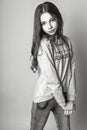 Cute girl teenage with long hair posing studio nature portrait. Black and white Royalty Free Stock Photo