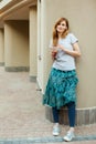 Cute girl walking around city with lemonade Royalty Free Stock Photo