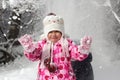 Kid walking and playing in snowy winter forest, winter wonderland, family travel Royalty Free Stock Photo