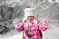 Kid walking and playing in snowy winter forest, winter wonderland, family travel Royalty Free Stock Photo