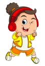 The cute girl is wearing casual and sporty costume with headphone on head