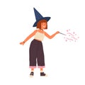Cute girl wearing witch hat conjuring with magic wand. Portrait of young female wizard or sorcerer. Adorable child