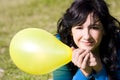 Cute girl with yellow colored balloon