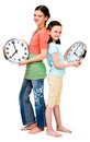 Cute girls holding clocks Royalty Free Stock Photo